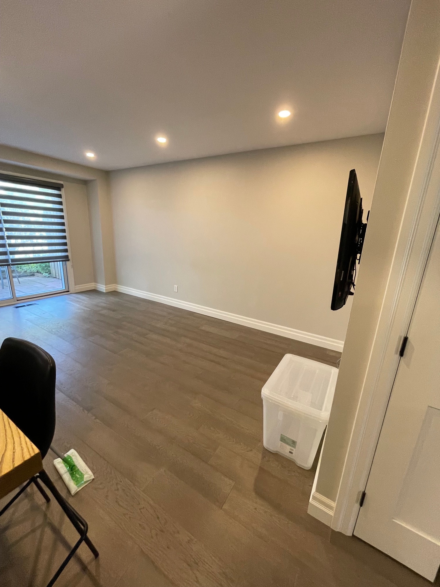 Living room before staging, unfurnished